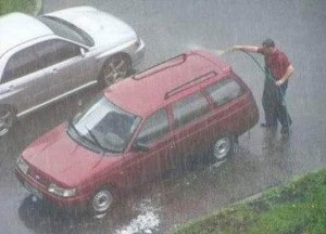 using commas before and or but A man is cleaning his car with a hose pipe, but there is also very heavy rain.